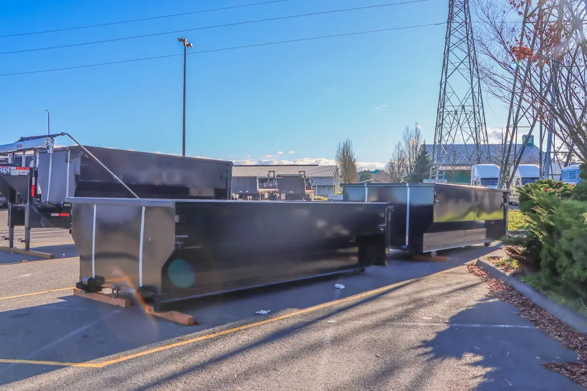 Roll-off dumpster ready for waste disposal at job site for 12 Yard Dumpster Rental in Grovetown